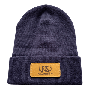 Navy fis beanie with a buffalo hide patch with an fis logo