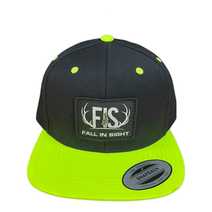 Black and neon green billed flatbill hat with a fis patch on the front