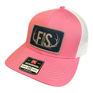 Pink trucker hat with a blue FIS patch 